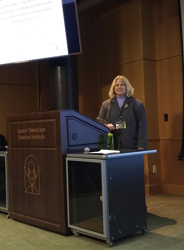 Noreen Grice at Science Institute Podium